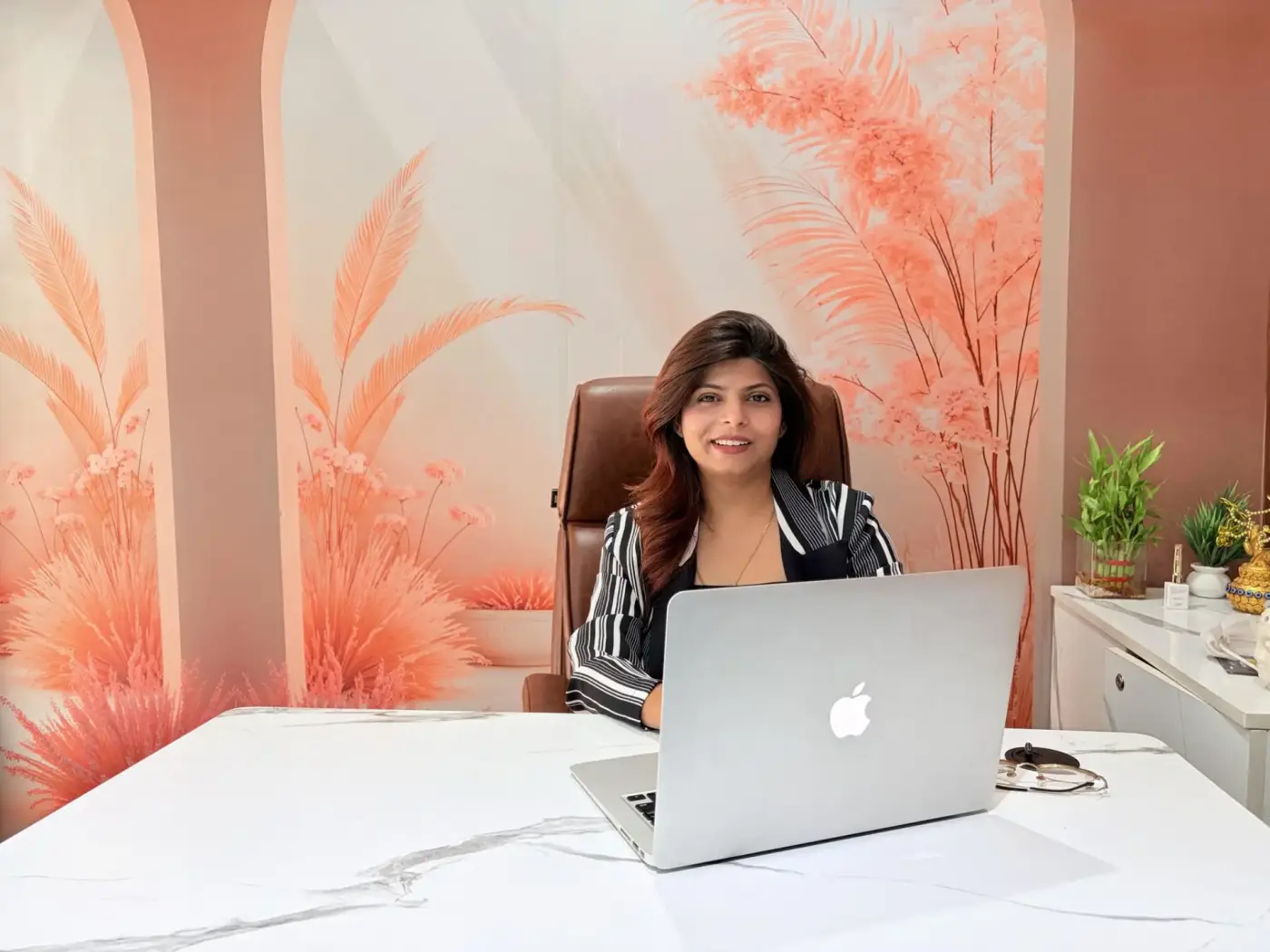 Founder of Luxtique Academy speaking directly to students from her office