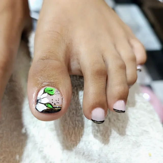Toe extension finished with custom art at Luxtique studio