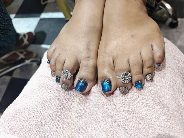 Toe extension built and shaped on a curved natural toe nail